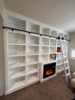 Custom Built Library With Built In Fire Place
