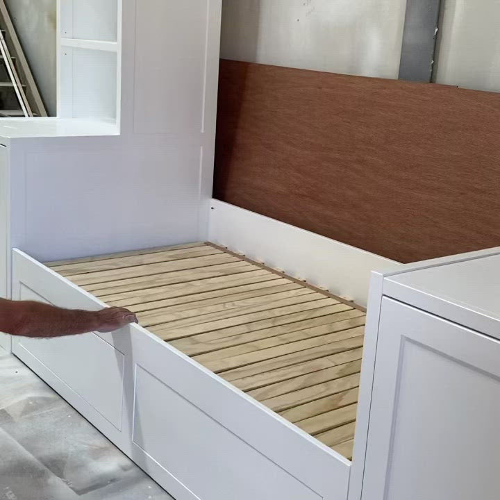 Custom daybed with side shelving units