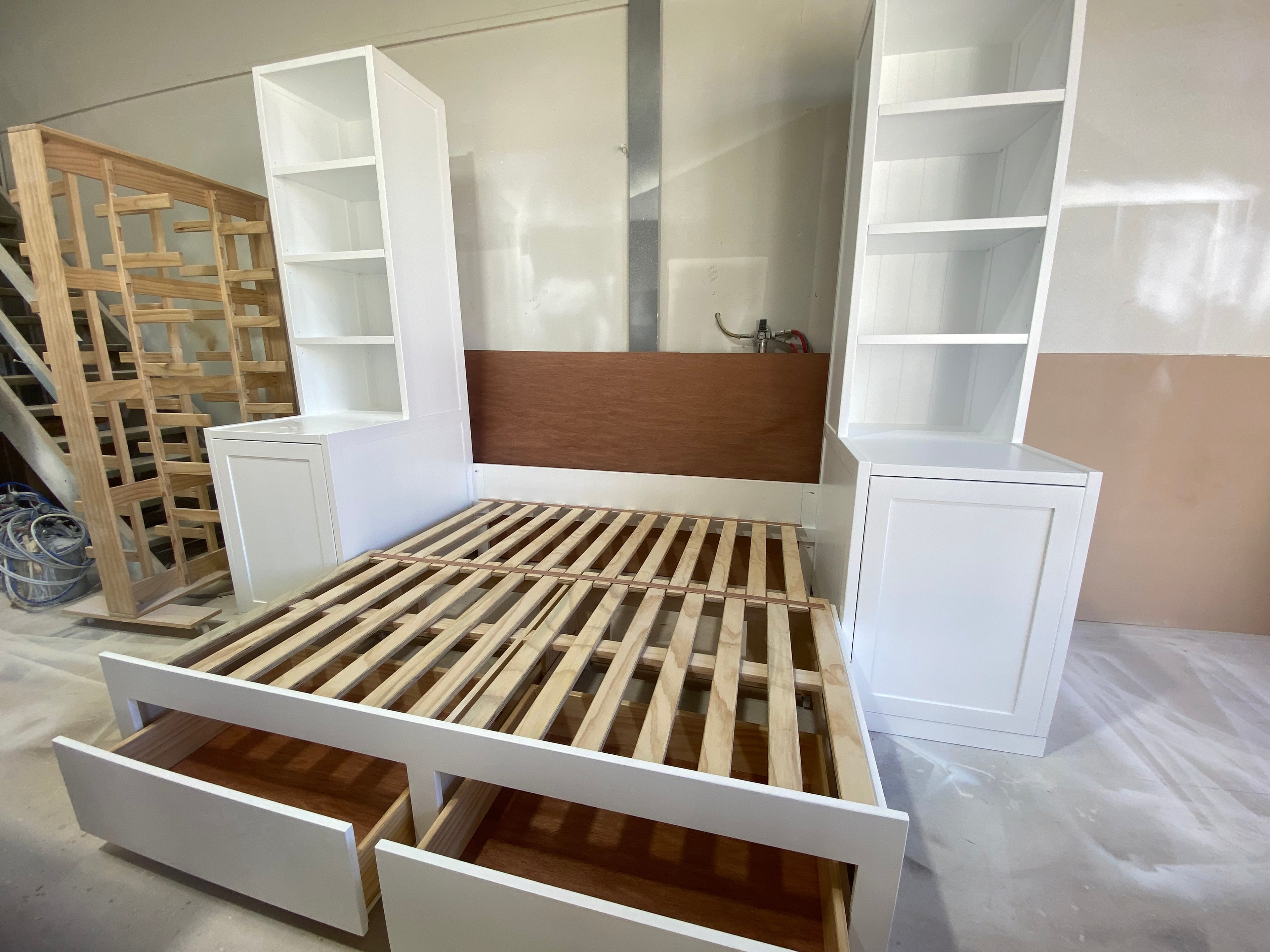 Custom daybed with side shelving units