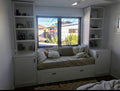 Custom daybed with side shelving units