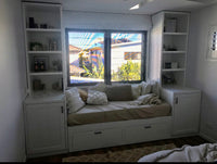 Custom daybed with side shelving units