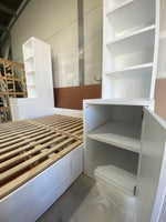 Custom daybed with side shelving units